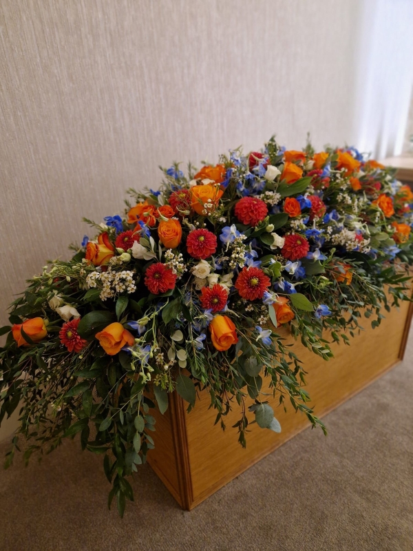 Orange, Blue & White Coffin Spray