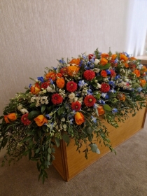 Orange, Blue & White Coffin Spray